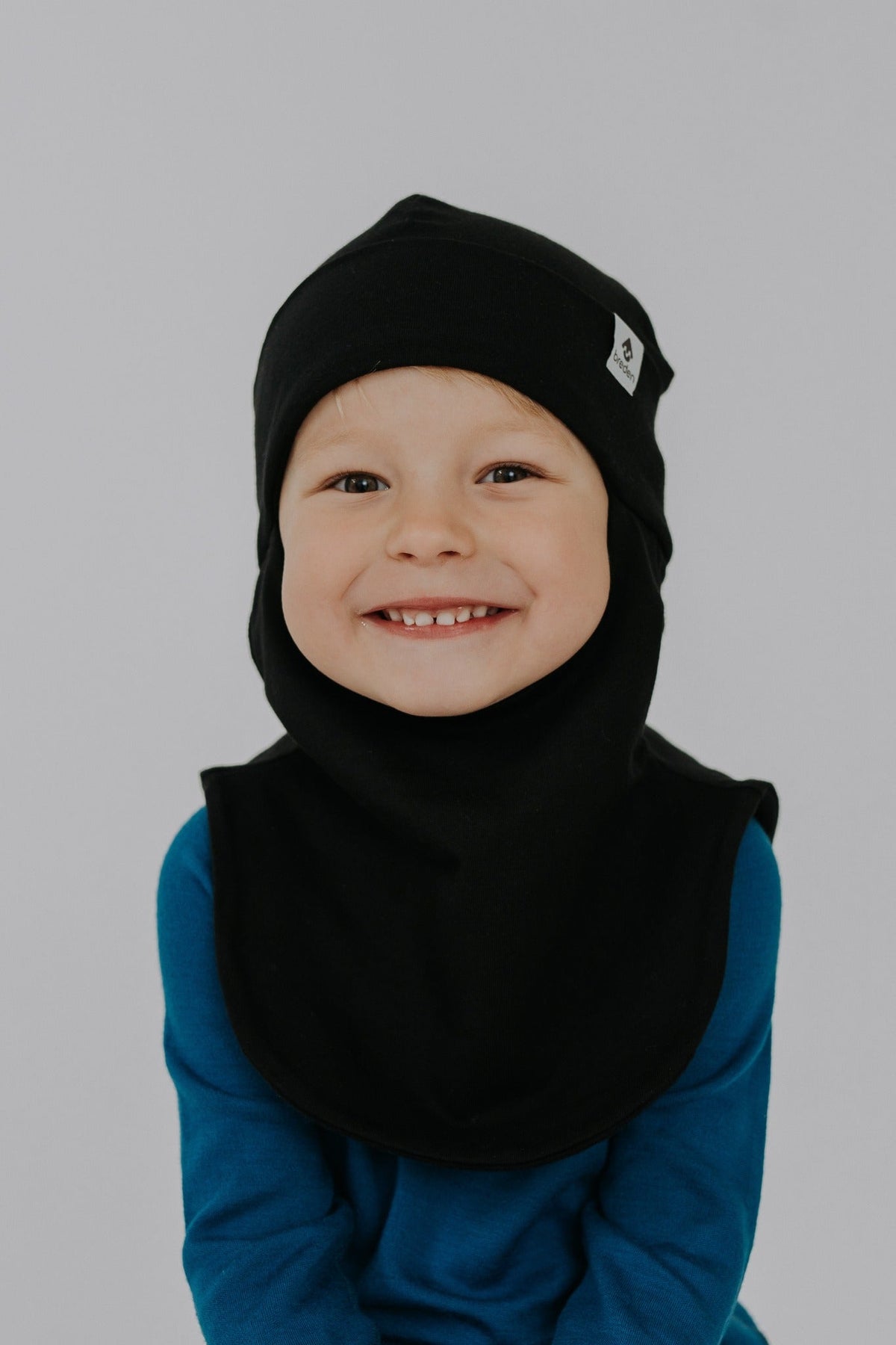 3 year old boy waring thermal black balaclava merino wool