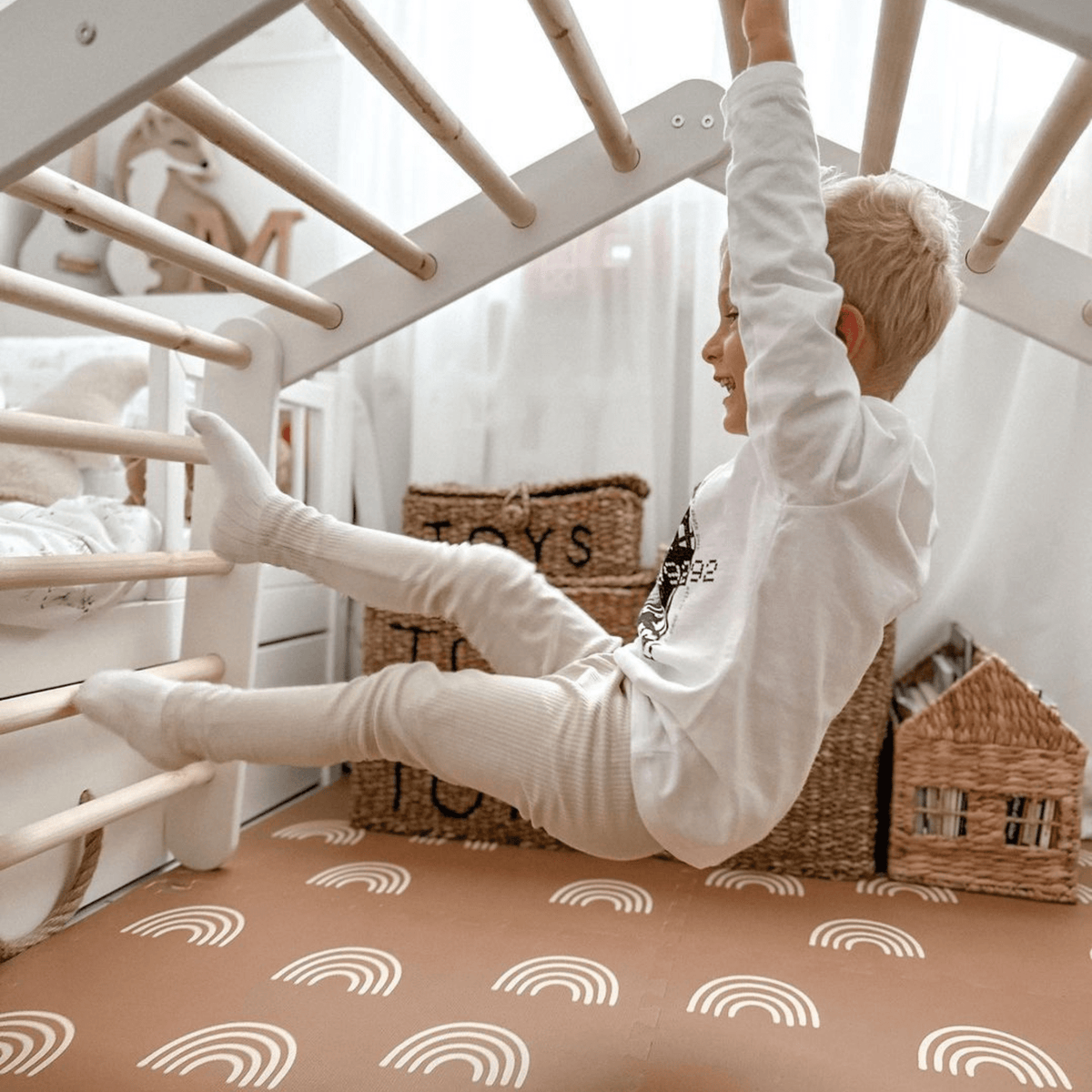 Large White Ladder House With a Blue-Grey Cover